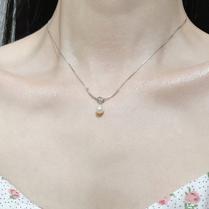 Timeless Knot & Pearl Necklace