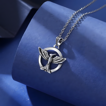 Symbolic Silver Bird Necklace