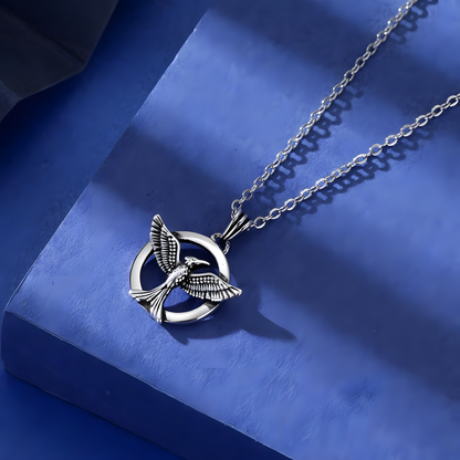 Symbolic Silver Bird Necklace